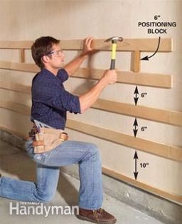 Space and nail plywood rails to garage wall for custom adjustable garage storage system-see multiple pins for additional photos